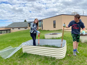 students working in garden