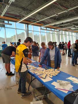 Students making fingerprints with ink