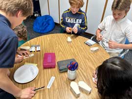 Students coloring with markers