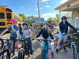Students preparing to ride bikes