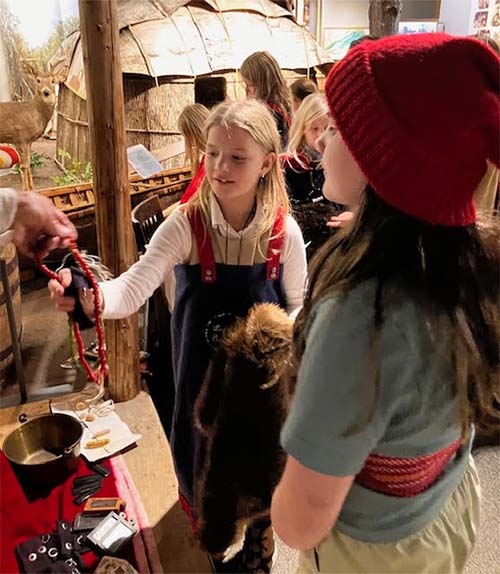 students in costume exploring