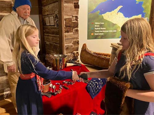 two students shaking hands