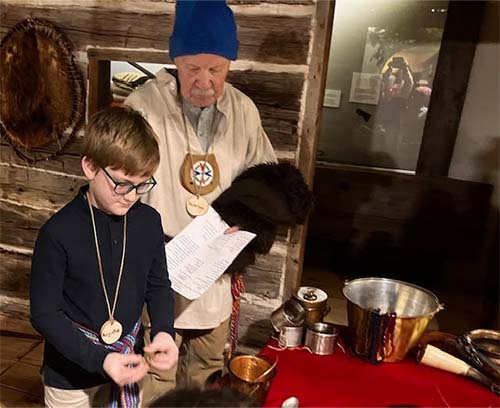 student acting in costume