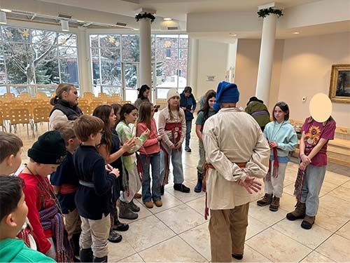 students gathered listening