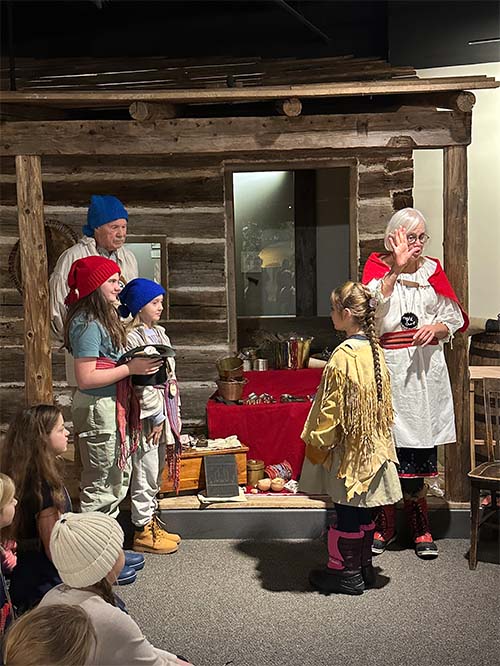 students in costumes acting