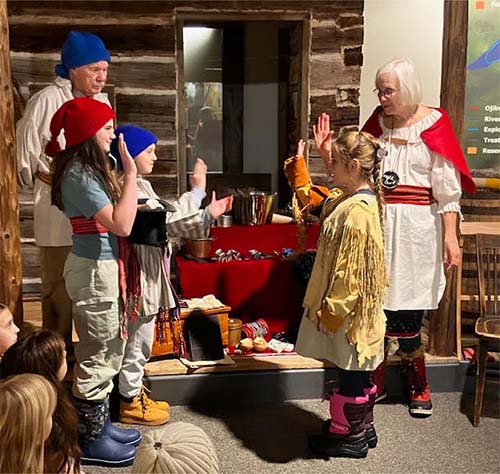 students in costume acting