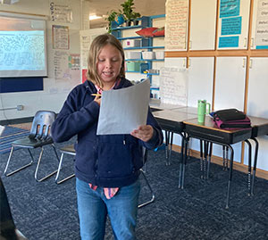 Student reading a script