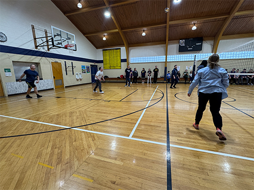 Students and staff enjoying an activity in the school gym