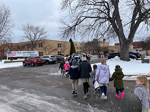 Outside view of students walking to school