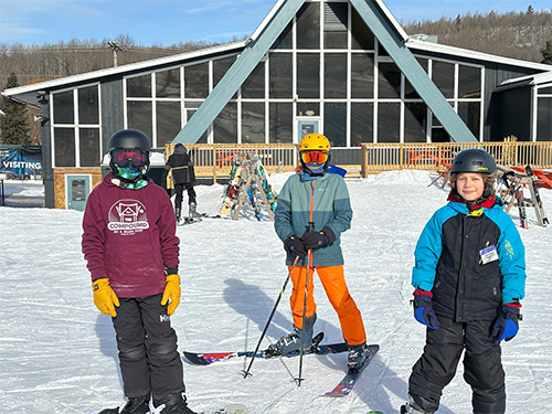 Students in front of ski lodge
