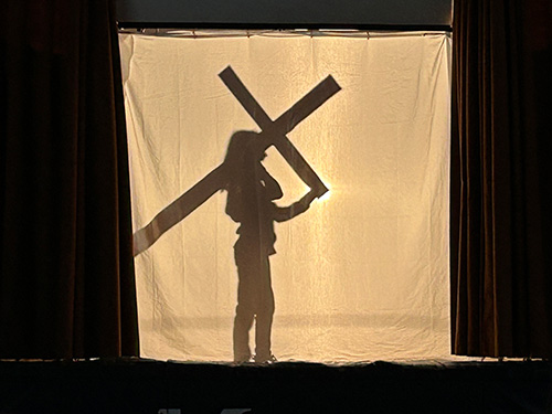 Jesus takes up his cross