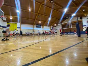 Volleyball game in gym