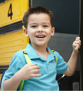 Student getting on a school bus