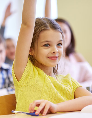 Student raising her hand in class