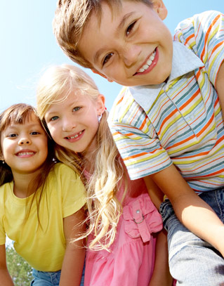 Three smiling children