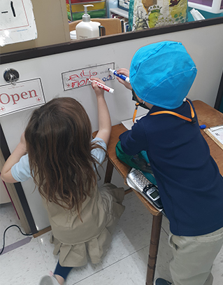 children at whiteboard